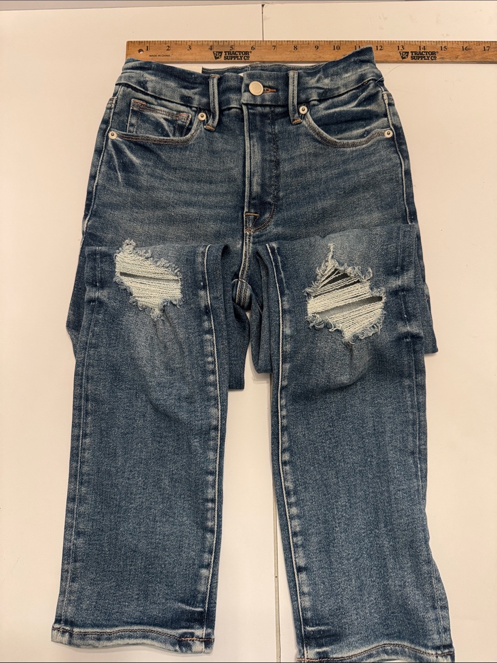 Good American Distressed Skinny Jeans in Medium Wash Blue